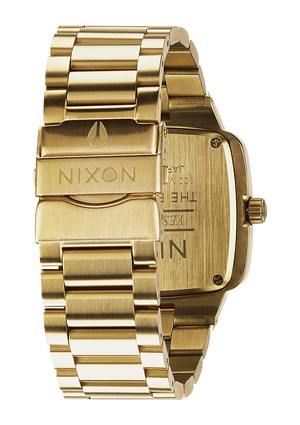 nixon_watches_the_big_player_all_gold_back